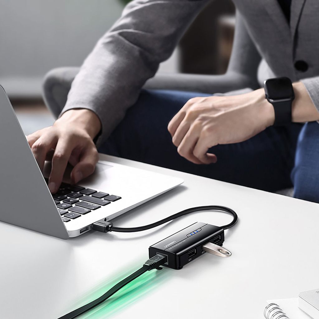 Ugreen 20264 RJ45 / USB-A nettverksadapter og USB HUB – 3 porter, svart