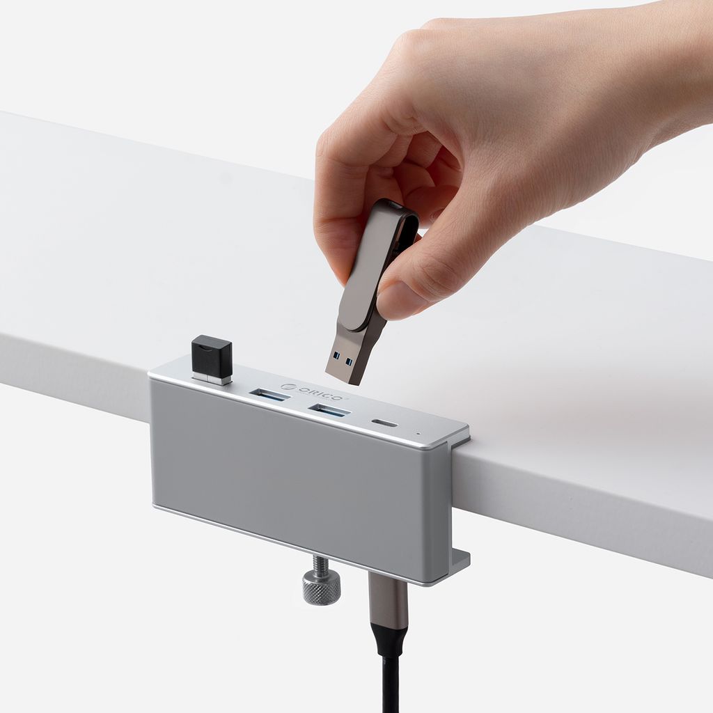 Orico MH4PC Hub kiinnitettävä USB-C / 3x USB-A 3.0 + 1x USB-C 3.0, silver
