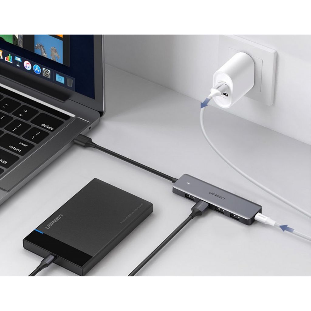 UGREEN CM219 USB-A-keskitin 4x USB-A 3.0 / 1x USB-C -liitännälle - Harmaa