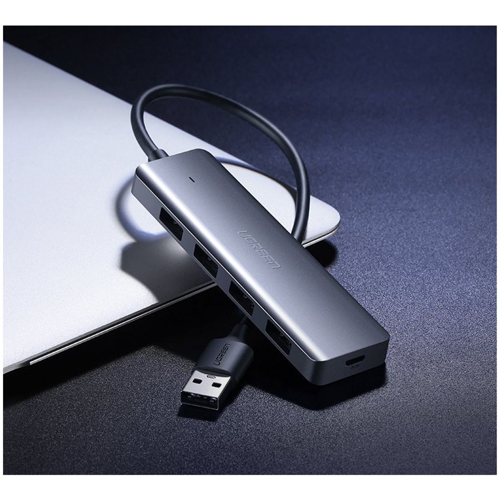 UGREEN CM219 USB-A-keskitin 4x USB-A 3.0 / 1x USB-C -liitännälle - Harmaa