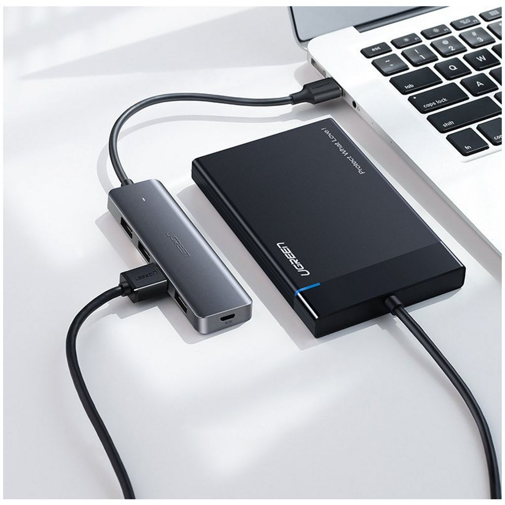 UGREEN CM219 USB-A-keskitin 4x USB-A 3.0 / 1x USB-C -liitännälle - Harmaa