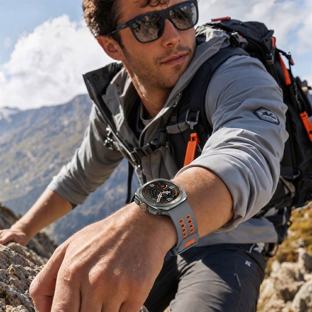 Samsung Galaxy Watch Ultra/Ultra2 Tofarget silikon klokkerem med dobbel spenne - Grå/oransje