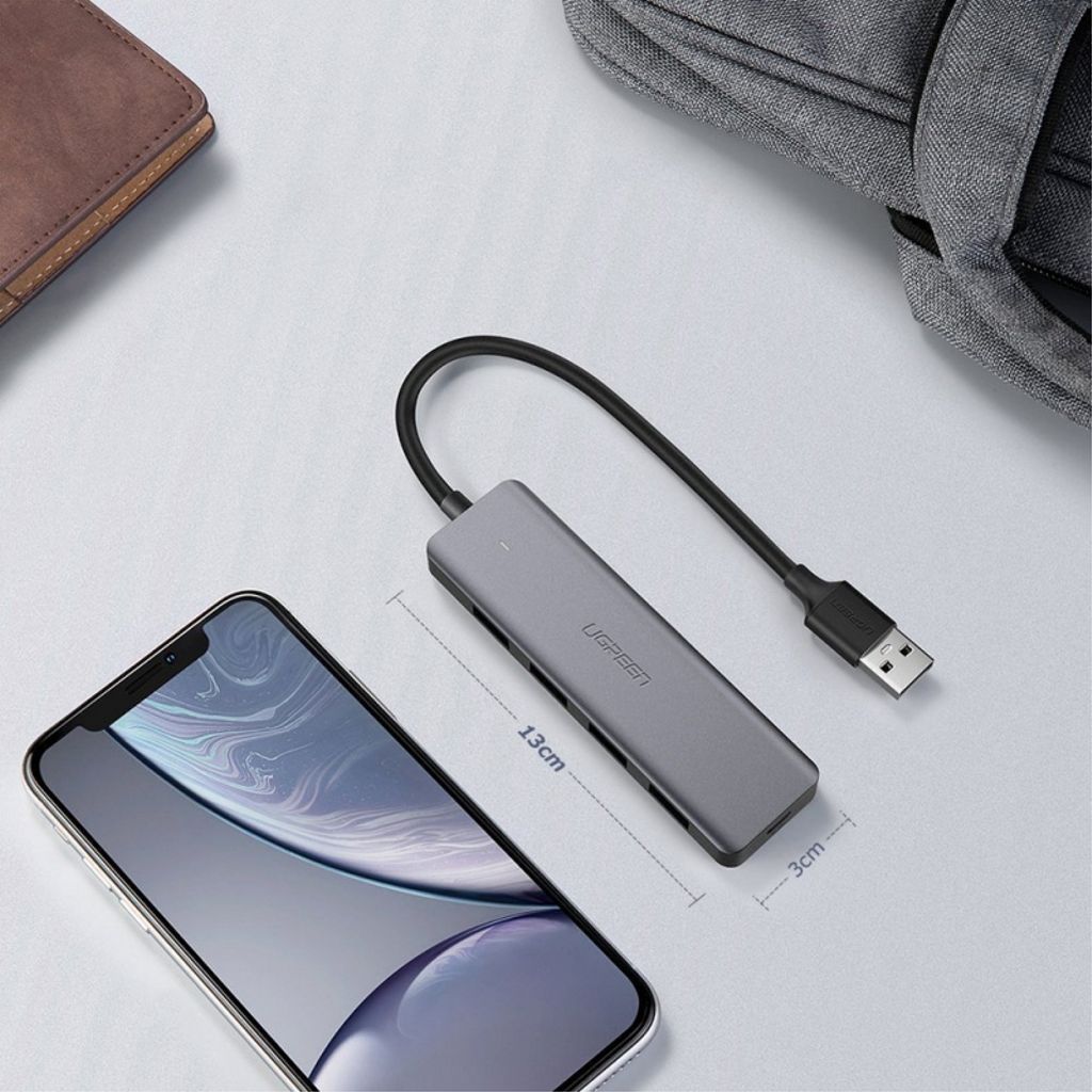 UGREEN CM219 USB-A-keskitin 4x USB-A 3.0 / 1x USB-C -liitännälle - Harmaa