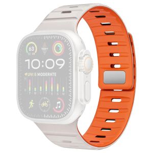 Apple Watch 42/44/45/46/49 mm kellonranneke silikonilla ja magneettisoljella – valkoinen/oranssi