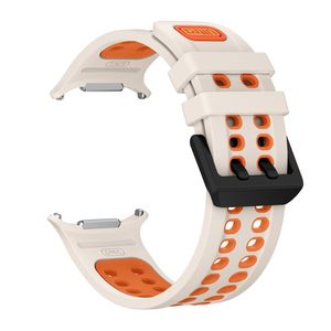 Samsung Galaxy Watch Ultra/Ultra2 Tofarget silikon klokkerem med dobbel spenne - Hvit/oransje